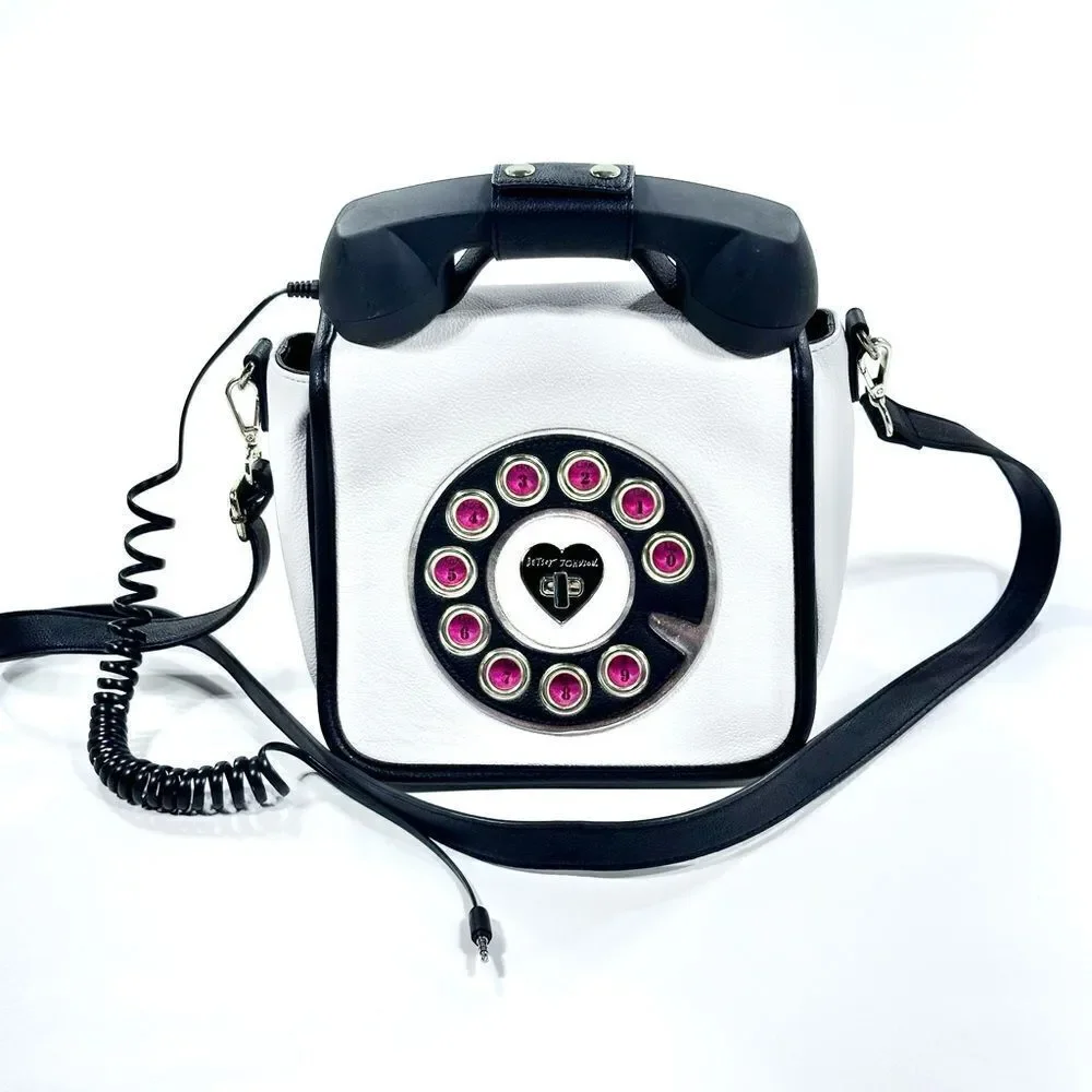 Betsy Johnson Kitsch white leather phone crossbody purse, connects to phone!